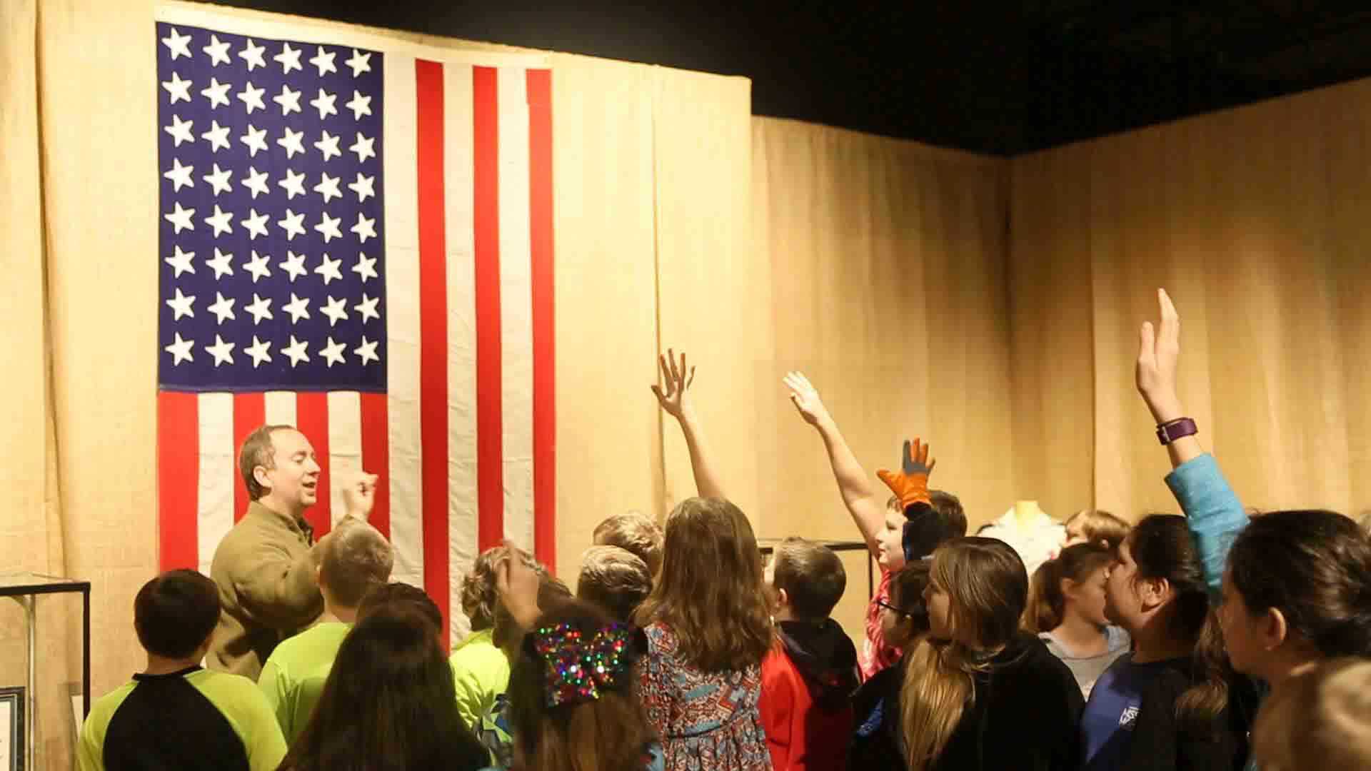 students hand raising